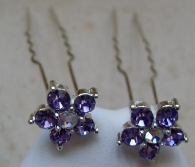 Epingles cheveux fleurs strass mauve.