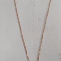 Sautoir chaînes dorées et pendentif pierre naturelle quartz rose.
