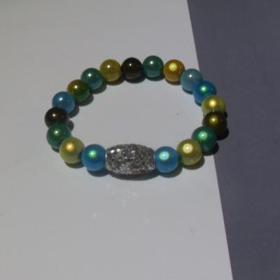 Bracelet bleu-vert-jaune, perles magiques et paillettes.