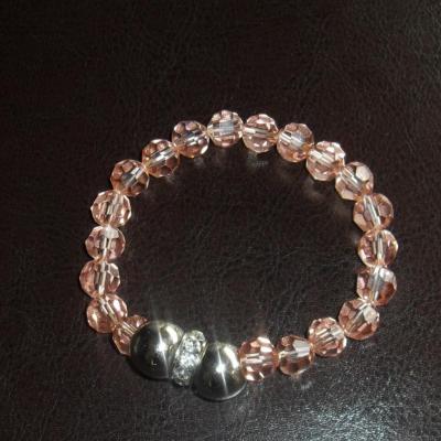 Bracelet cristal rose, perles métal argenté et strass blanc.