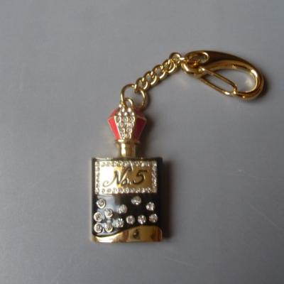 Porte clefs- bijou de sac, clé usb 8 gb, flacon de parfum doré et strass.